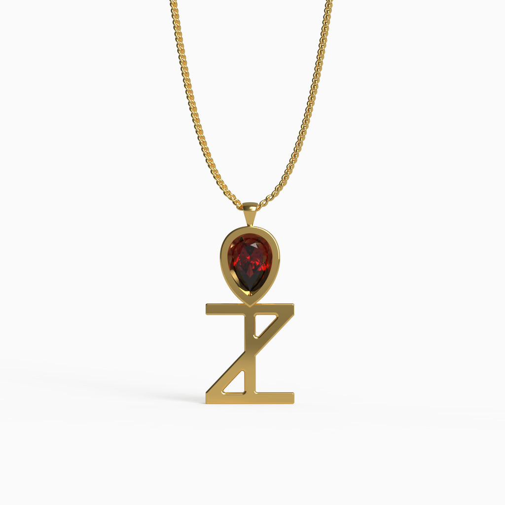 Ankh Motif Pendant in Yellow Gold and Ruby image 0