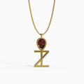 Ankh Motif Pendant in Yellow Gold and Ruby image 0