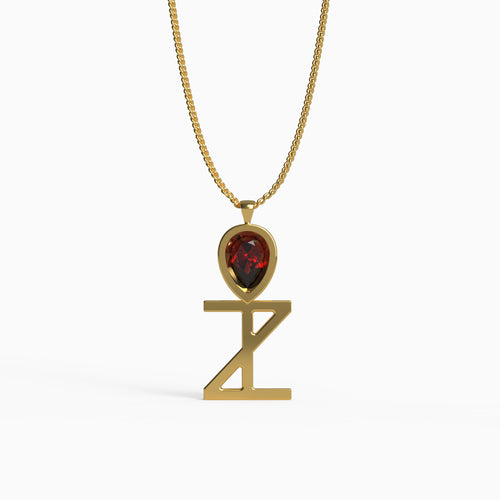 Ankh Motif Pendant in Yellow Gold and Ruby image 0