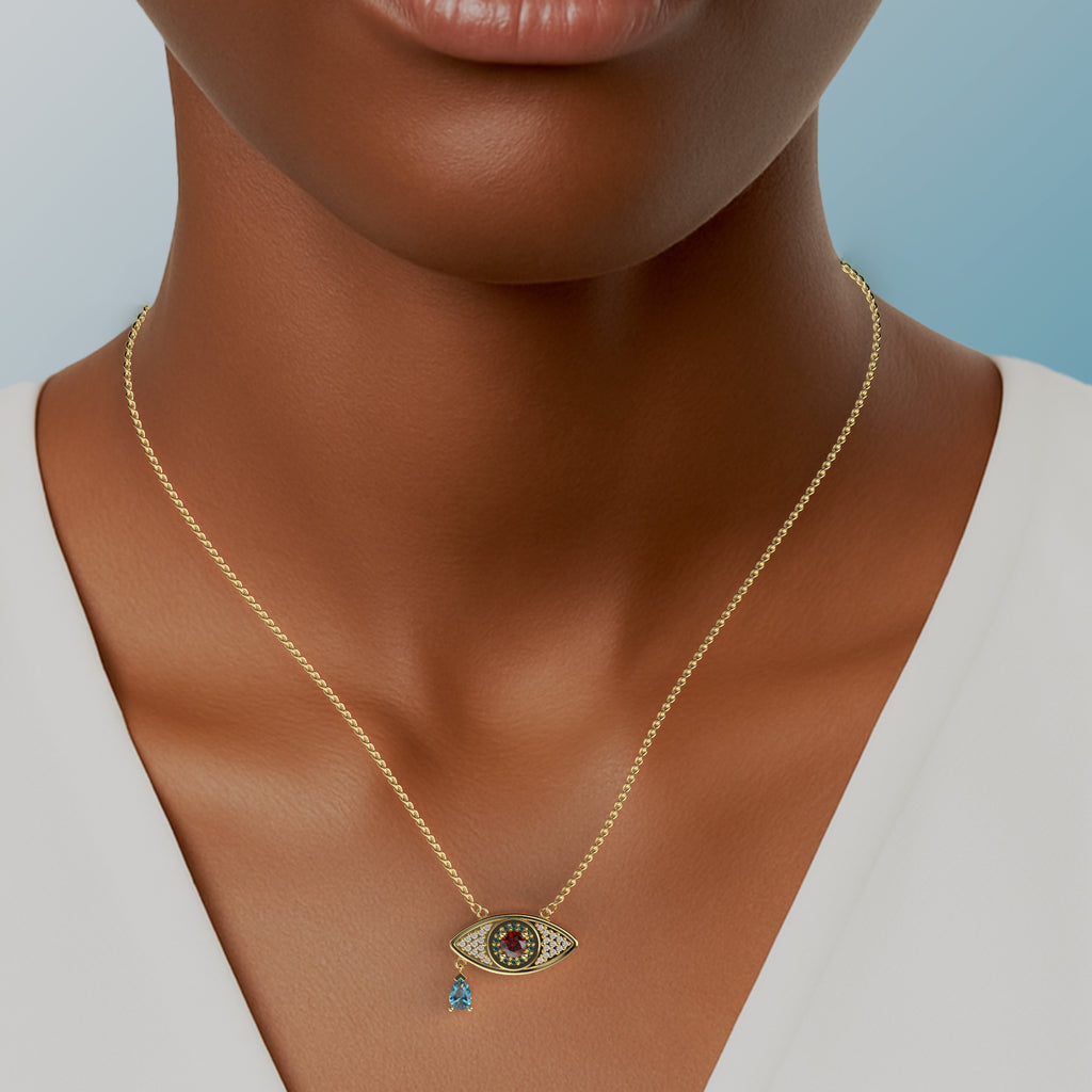 Serpent Evil Eye Pendant in Yellow Gold, Diamond, Ruby, Swiss Blue Topaz image 1