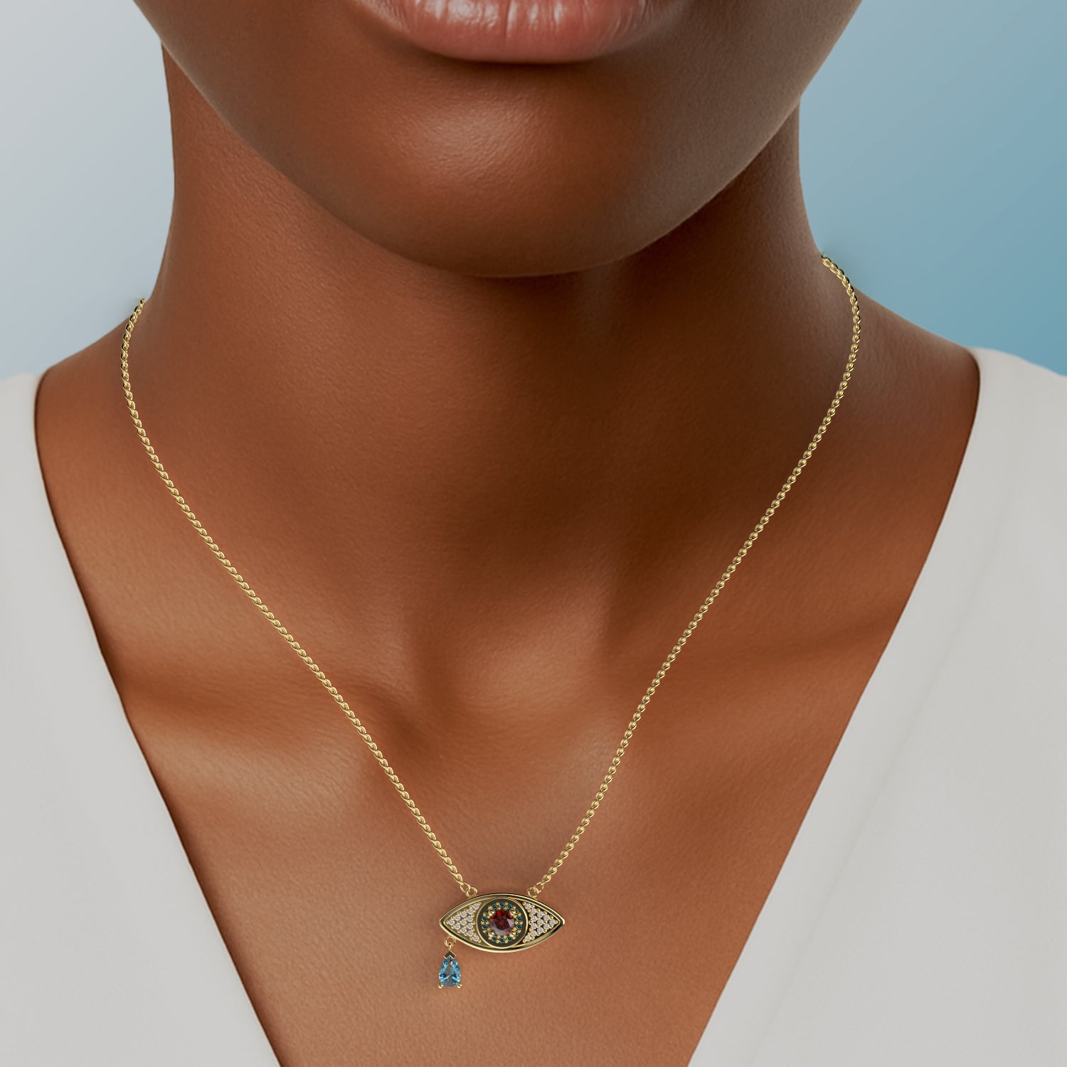 Serpent Evil Eye Pendant in Yellow Gold, Diamond, Ruby, Swiss Blue Topaz image 1